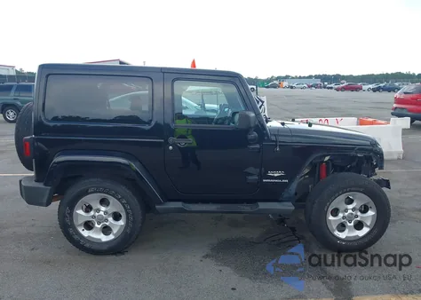 2015 Jeep Wrangler Sahara z USA, uszkodzony, nr VIN 1C4AJWBG4FL605659